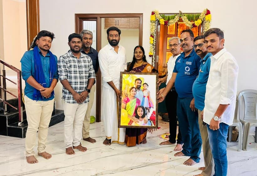 Members at a housewarming function