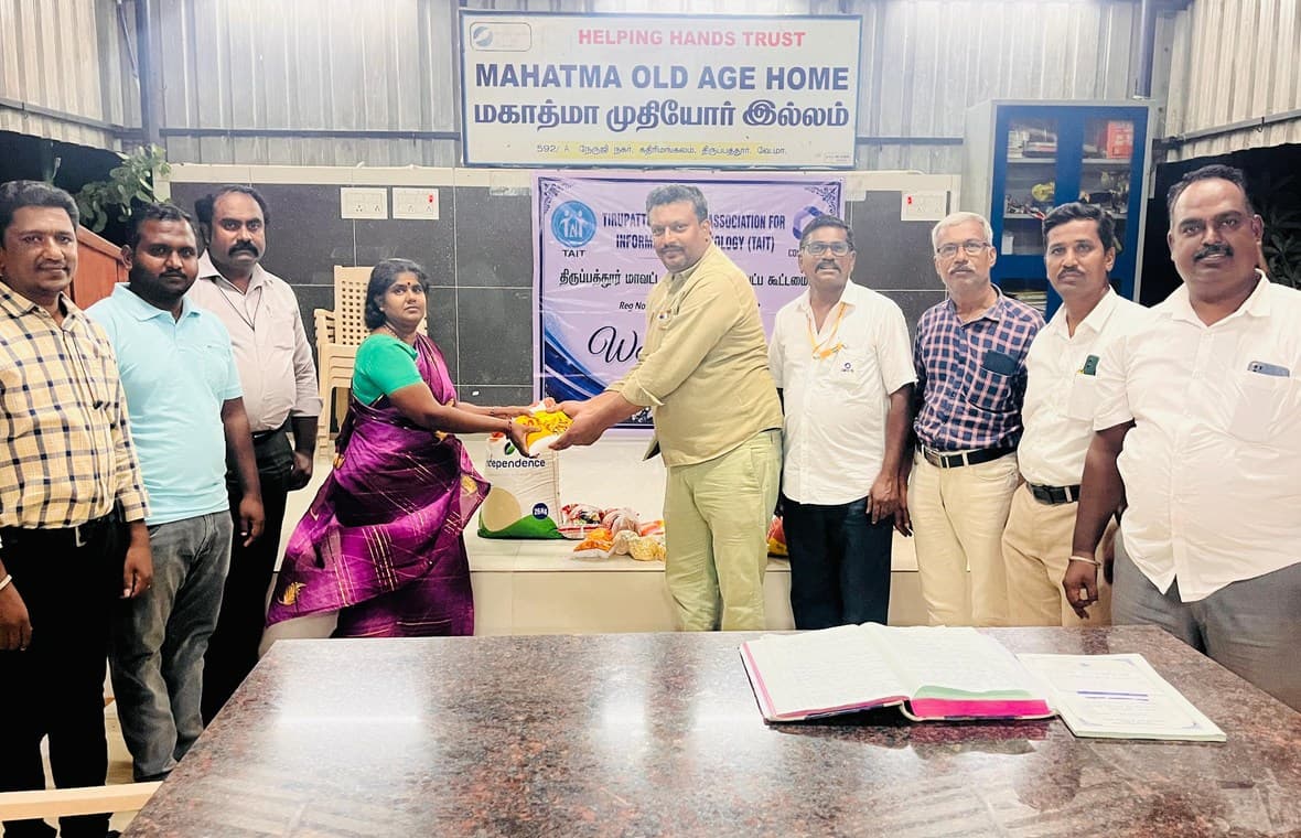 Handing over groceries at Mahatma Old Age Home